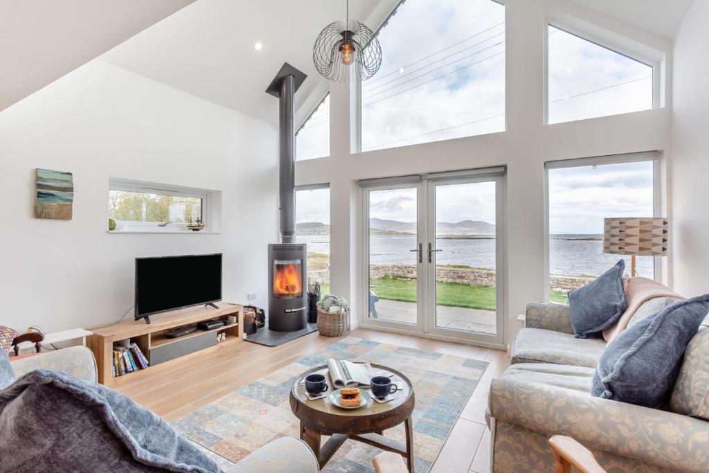 a living room with a couch and a tv at 4 Bed in Isle Of Skye oc-b29965 in Broadford