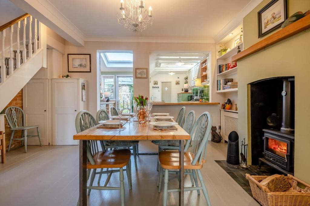 a kitchen and dining room with a table and chairs at 2 Bed in Wimborne oc-s30924 in Wimborne Minster