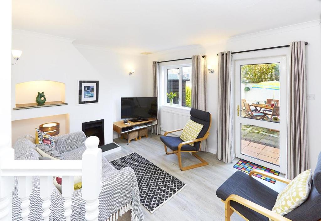 a living room with a couch and a tv at 2 Bed in St. Ives oc-p00693 in Carbis Bay