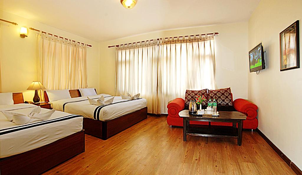 Postel nebo postele na pokoji v ubytování Hotel Amaryllis