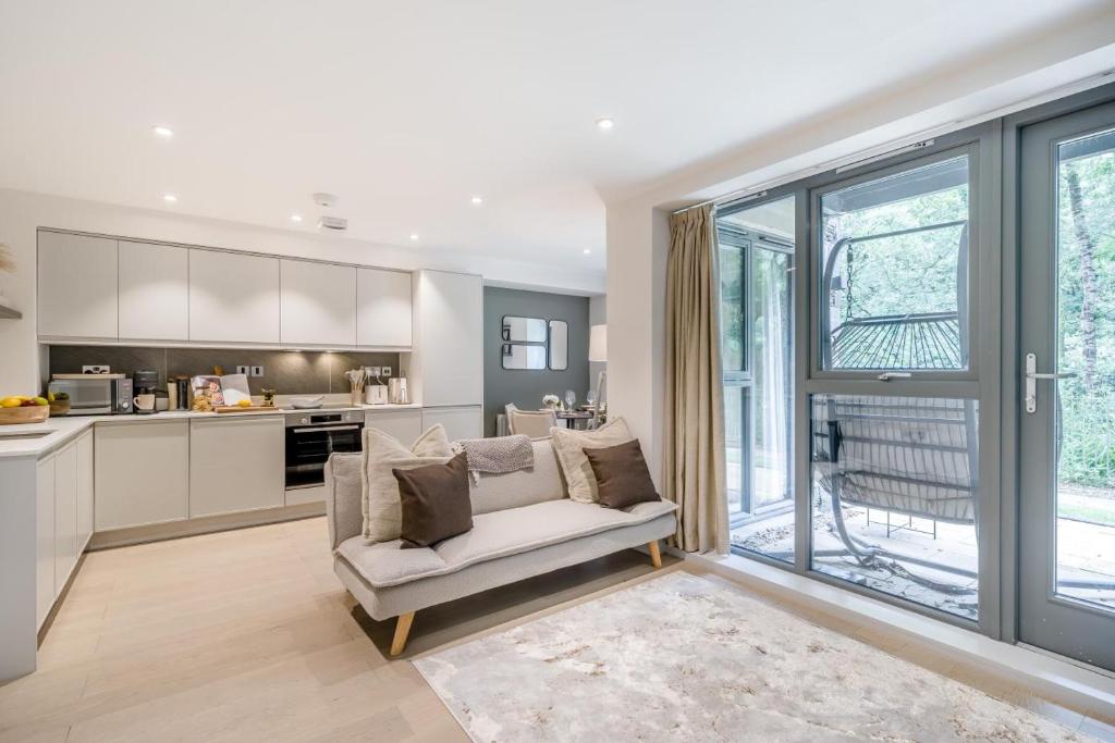 a living room with a couch and a kitchen at 1 Bed in Backbarrow oc-s32477 in Backbarrow