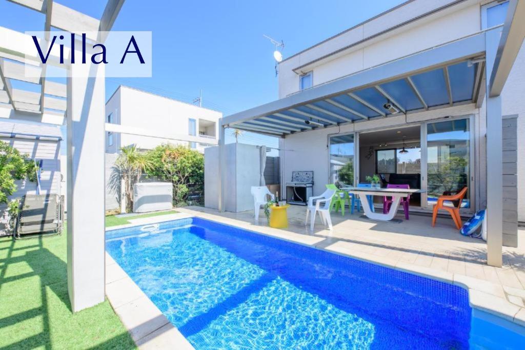 a villa with a swimming pool and a house at Pool Villa Mito - Pool Villa 水戸 in Mito