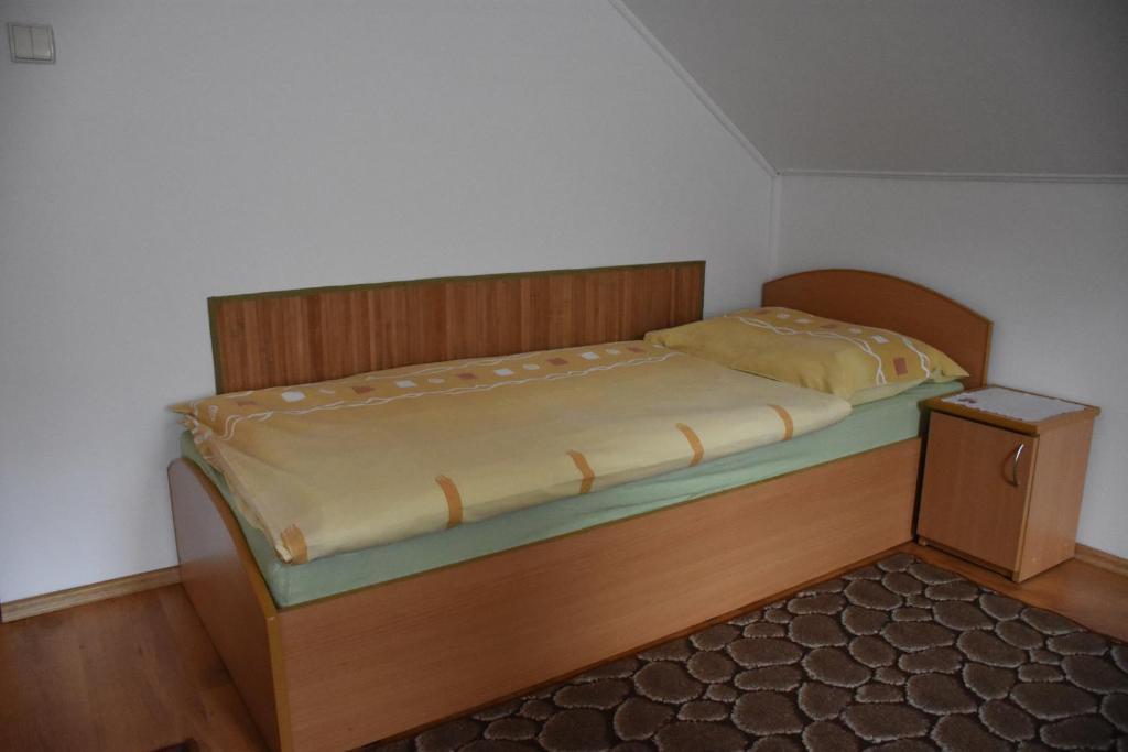 Postel nebo postele na pokoji v ubytování KÓŃSKO SIGŁA