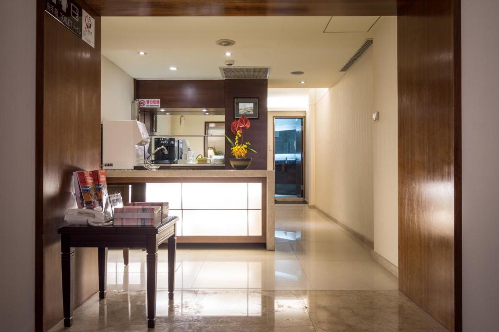 Kuchyň nebo kuchyňský kout v ubytování Delight Hotel