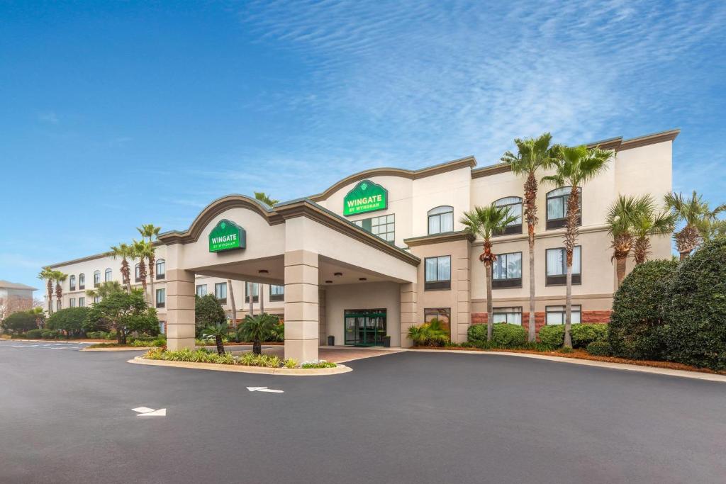 a rendering of the front of a hotel at Wingate by Wyndham Destin in Destin