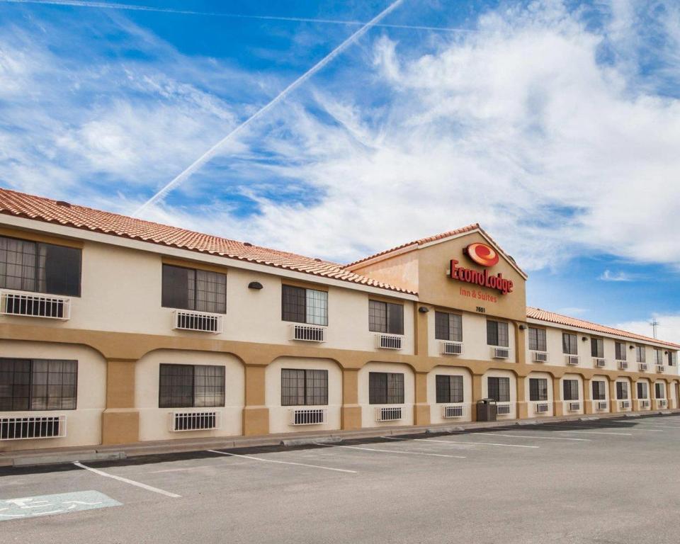 a hotel with a sign on the side of a building at Econo Lodge Inn & Suites El Paso West in El Paso