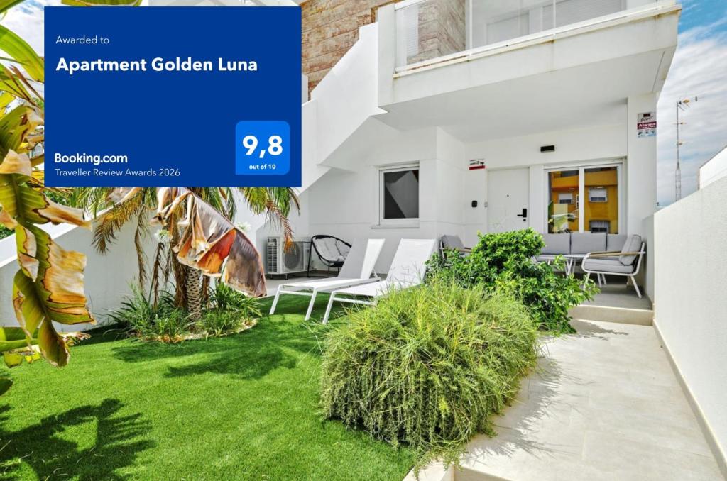 a house with a sign that reads apartment golden lane at Apartment Golden Luna in San Pedro del Pinatar