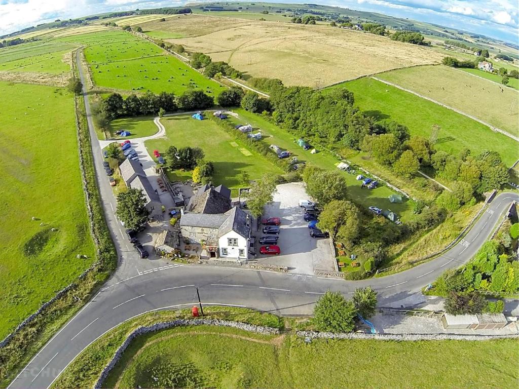 an aerial view of a house with a parking lot at The Royal Oak in Buxton