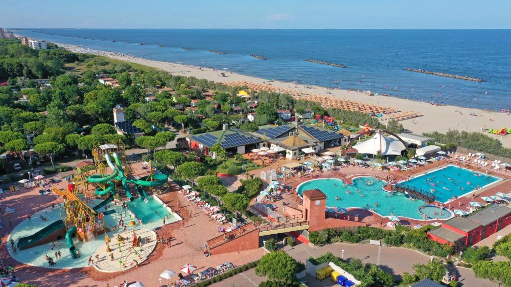 an aerial view of an amusement park next to the beach at Holiday Park Spiaggia e Mare in Porto Garibaldi