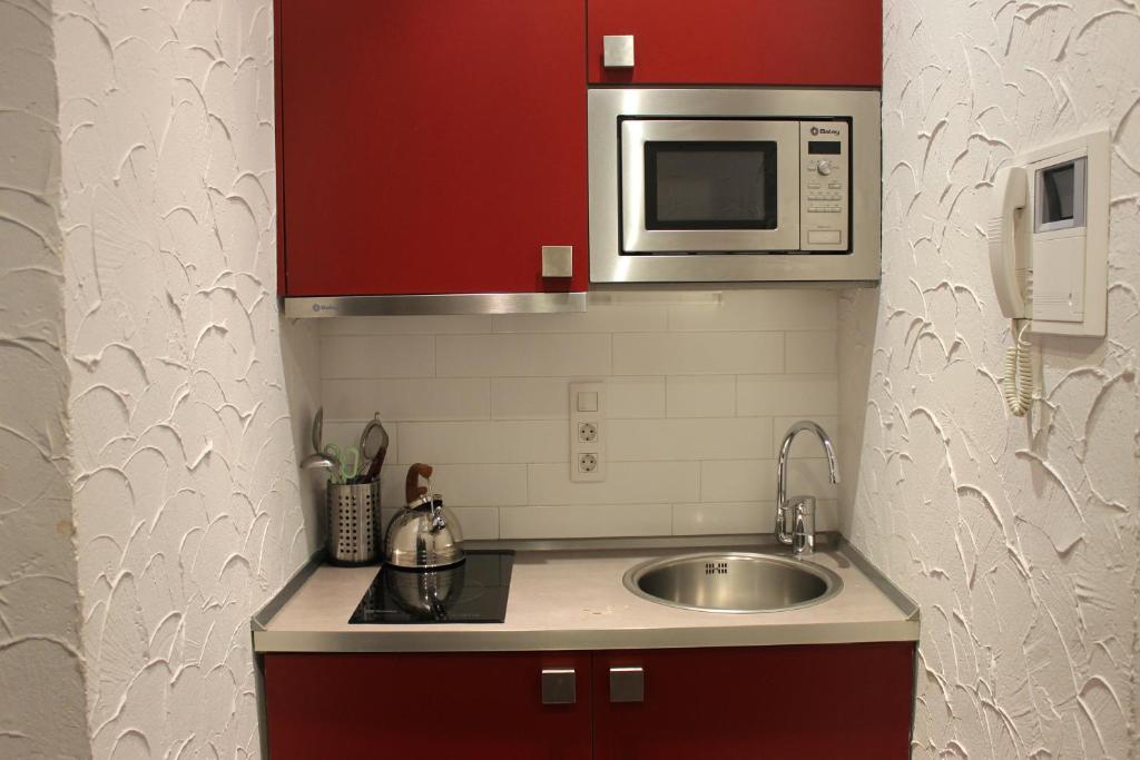 Kuchyňa alebo kuchynka v ubytovaní Apartaments Ciutat Vella