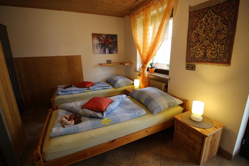 Posteľ alebo postele v izbe v ubytovaní Gästehaus Schachnerhöhe