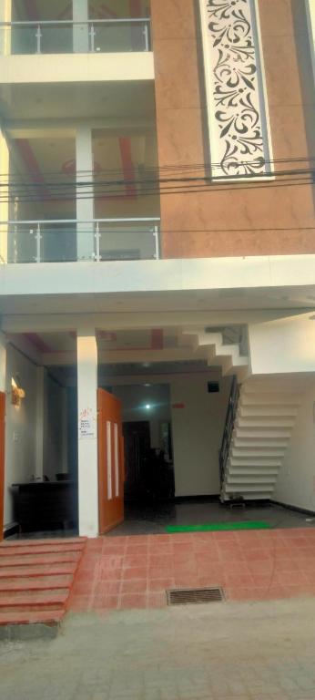an empty building with stairs and a stair case at Hotel Kanha palace in Lucknow