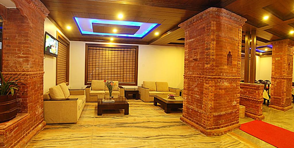 Posezení v ubytování Hotel Buddha