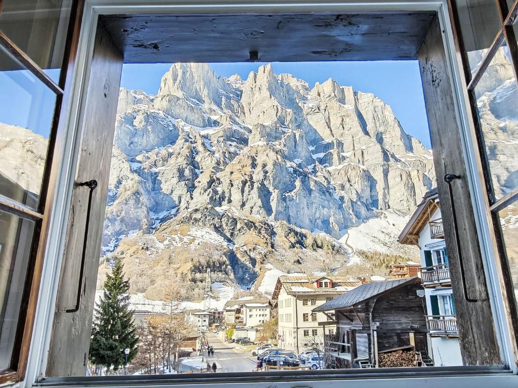 a view of a mountain from a window at Apartment Studio Turmalin by Interhome in Leukerbad