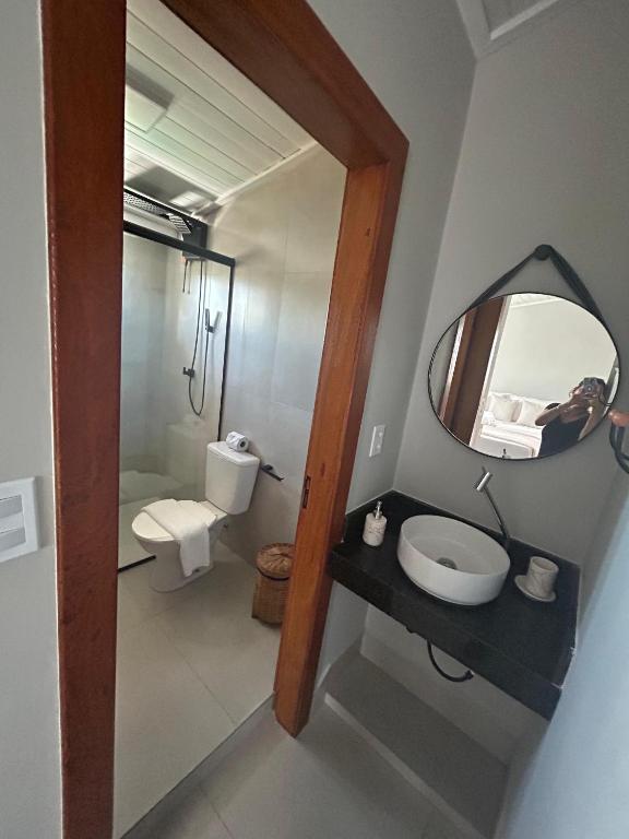 a bathroom with a sink and a mirror at Casa Prado in Prado