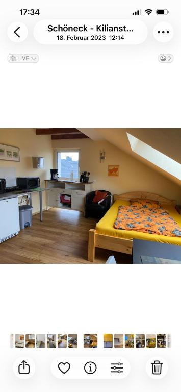 a picture of a kitchen and a living room at Monteurszimmer Schöneck in Schoneck