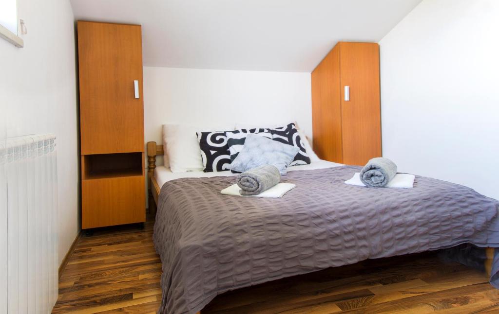 Posteľ alebo postele v izbe v ubytovaní Guesthouse Pavlin