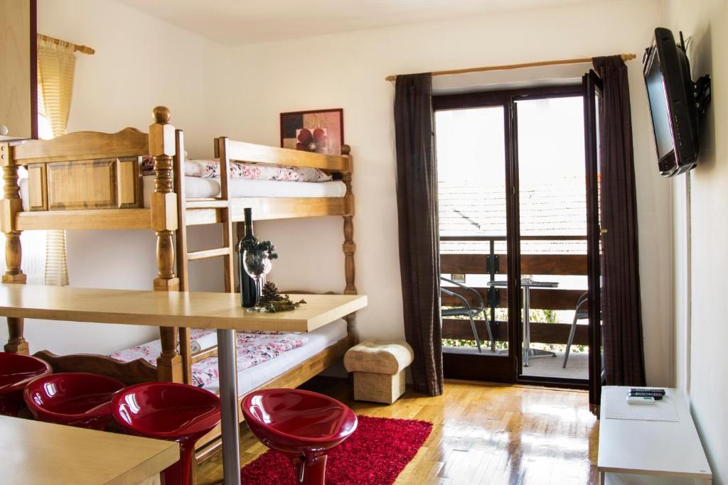Televízia a/alebo spoločenská miestnosť v ubytovaní Guesthouse Pavlin