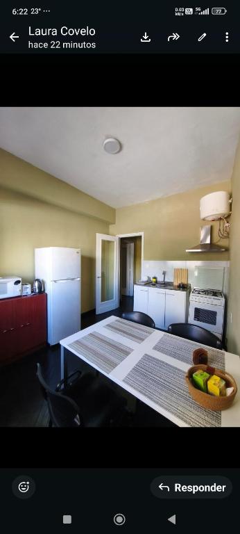 a view of a kitchen with a table in a room at Libertador 2 in Montevideo