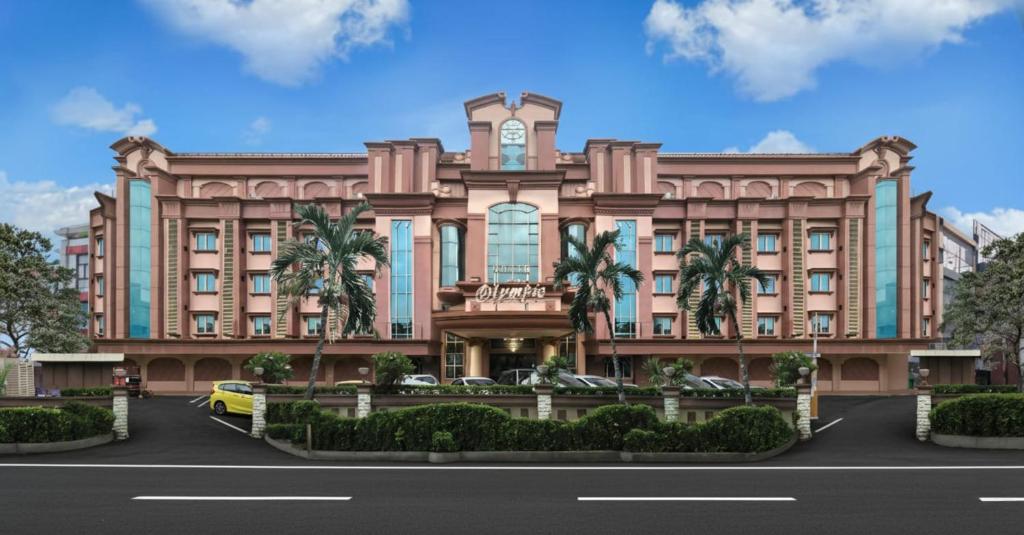 a rendering of a large building with a road in front at Olympic Hotel Jakarta in Jakarta
