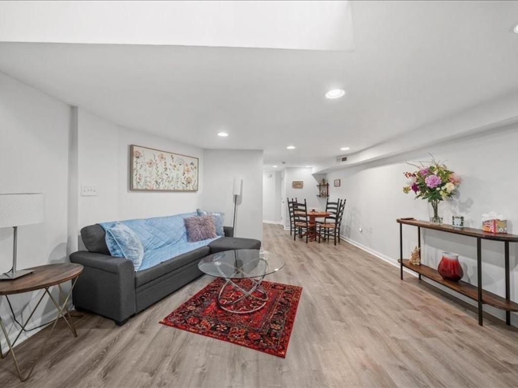 a living room with a couch and a table at May House in Washington, D.C.