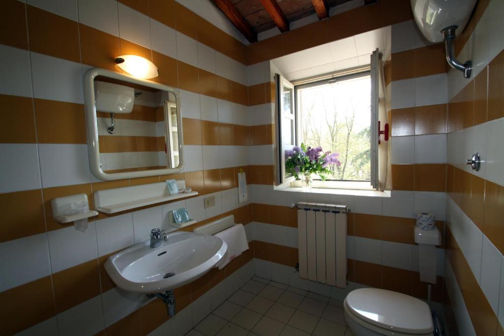 Koupelna v ubytování Hotel Calzaiolo