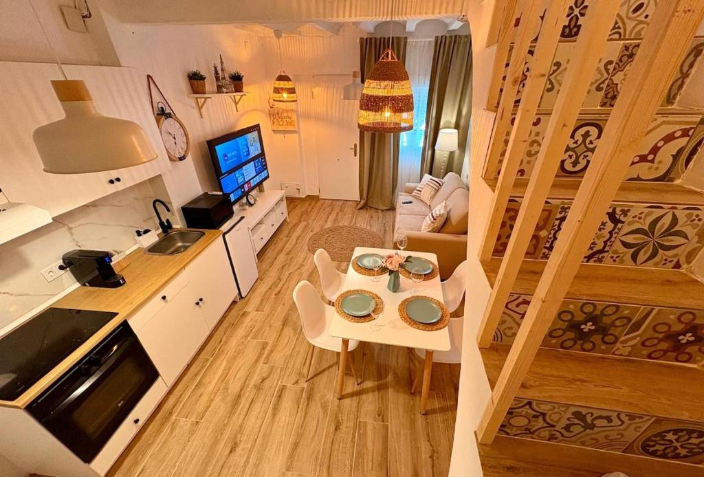 an overhead view of a kitchen and a living room at Las Casitas de Cullera Sol y Mar in Cullera