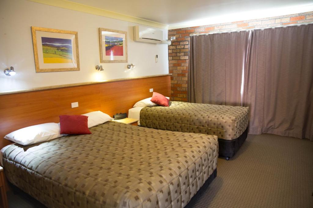 Postel nebo postele na pokoji v ubytování Scone Motor Inn & Apartments