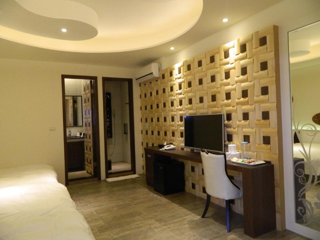 TV a/nebo společenská místnost v ubytování Dream Ocean View B&B