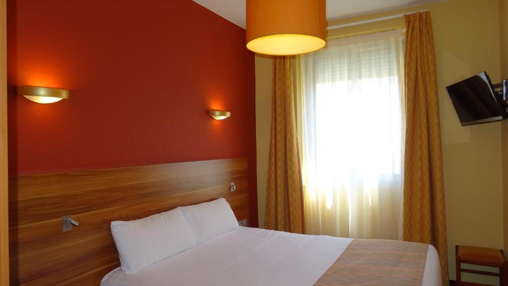 Postel nebo postele na pokoji v ubytování Residence Share Inn