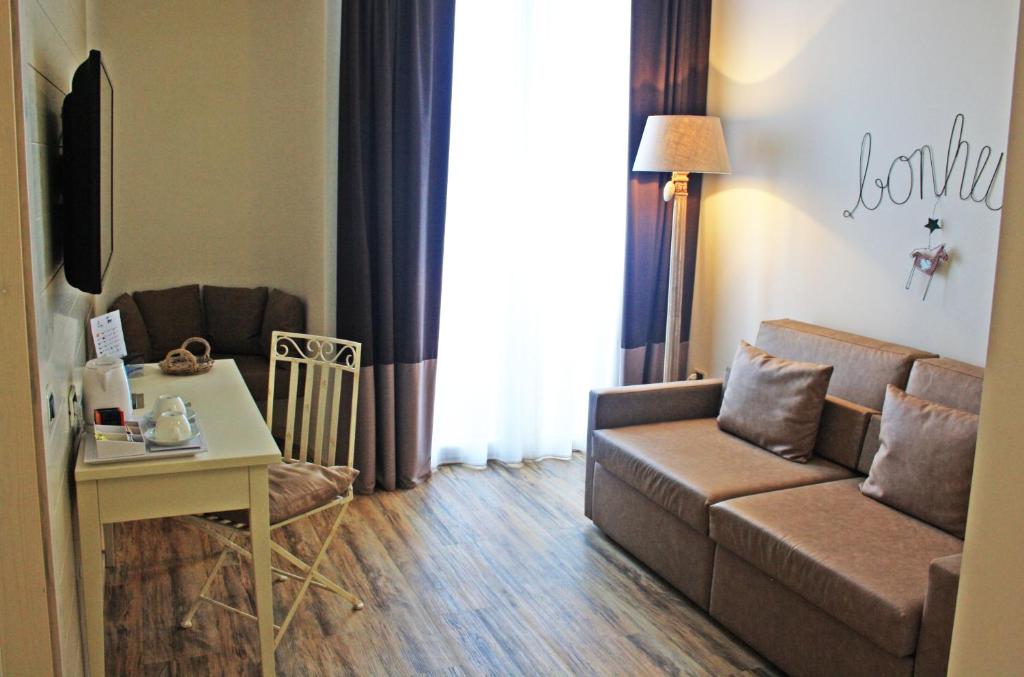 TV a/nebo společenská místnost v ubytování Hotel Universal