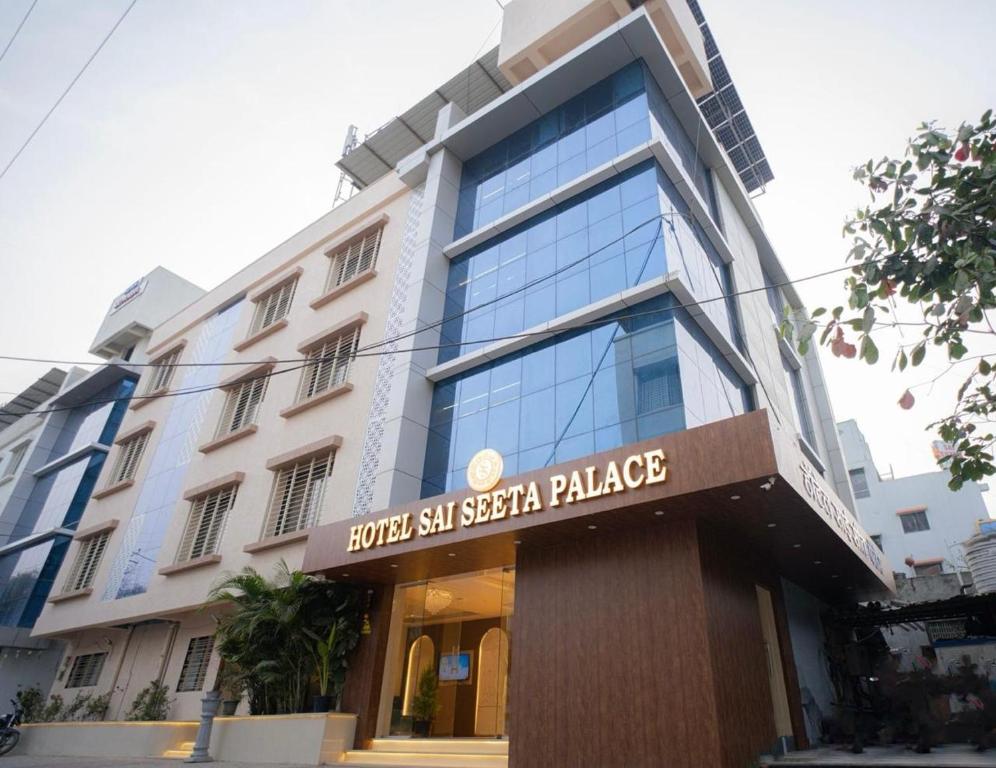 a building with a sign in front of it at Hotel Sai Seeta Palace Newly Renovated in Shirdi