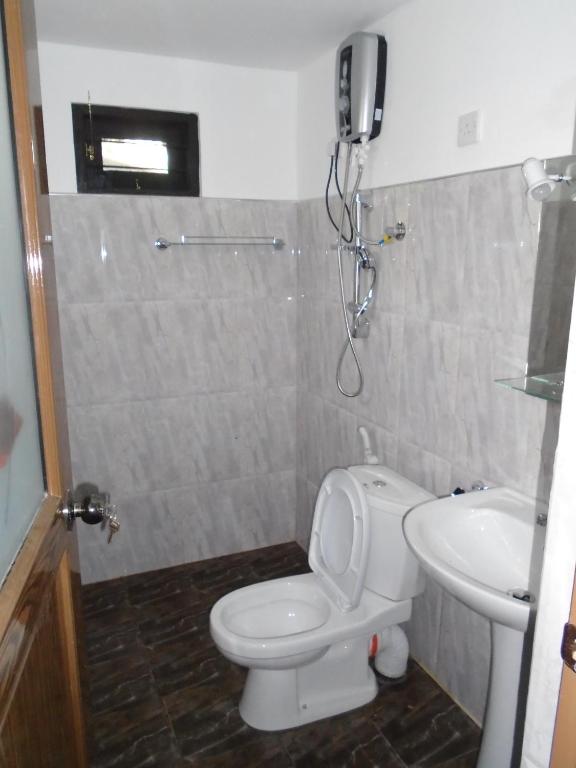 Koupelna v ubytování Livinginn Polonnaruwa