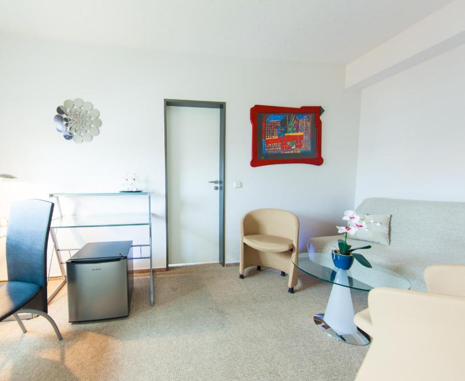 Posezení v ubytování Garni-Hotel An der Weide