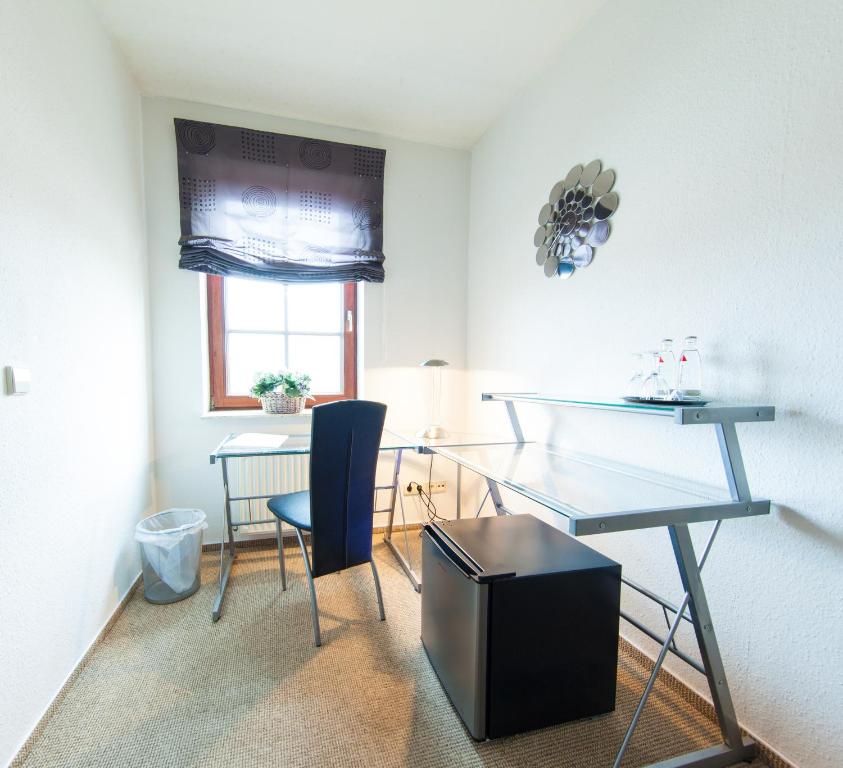 Posezení v ubytování Garni-Hotel An der Weide