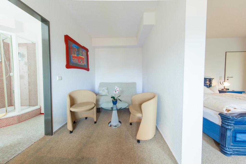 Posezení v ubytování Garni-Hotel An der Weide