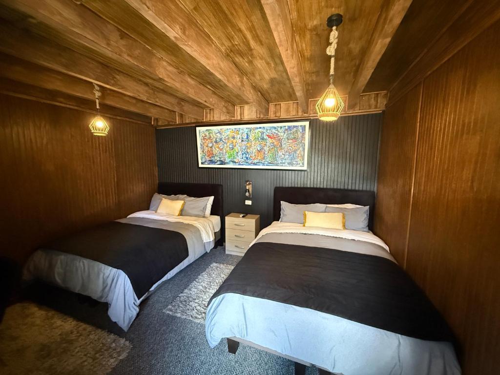 Hostal Suomi tesisinde bir odada yatak veya yataklar