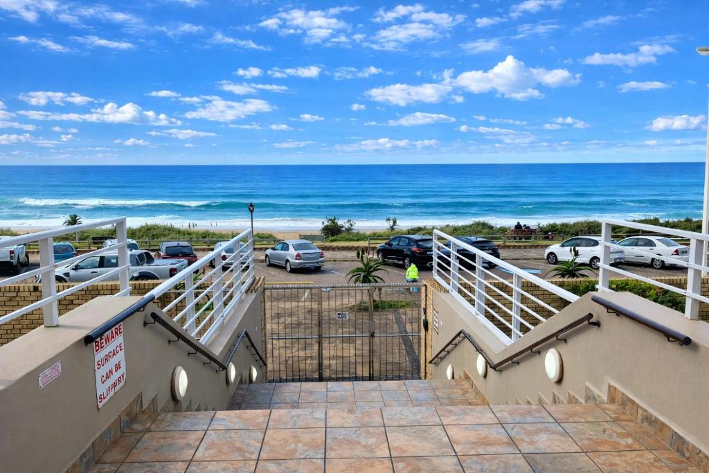 a view of the ocean from the balcony of a condo at 32 Warnadoone- On Warner beach-Amanzimtoti in Kingsborough
