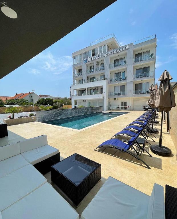 a view of a hotel with a swimming pool at Bilali Apartments in Ulcinj