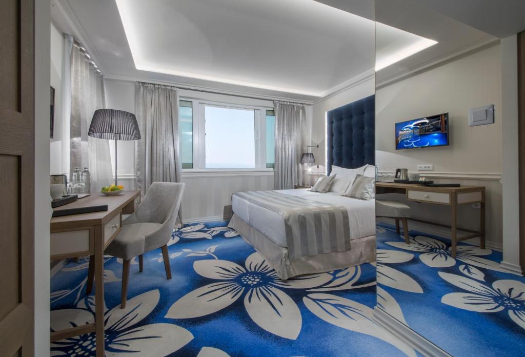 Posteľ alebo postele v izbe v ubytovaní Grand Hotel Slavia - Adults only