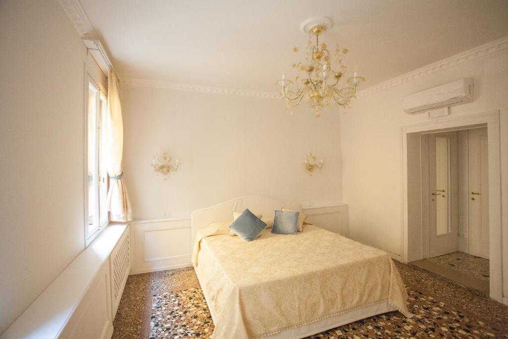 Cama o camas de una habitación en Antico Mercato