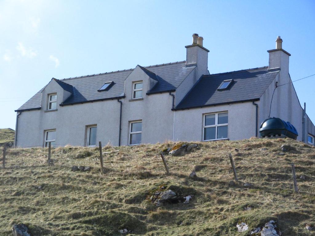 a house on the top of a hill at Valtos 23 Isle of Lewis in Uig