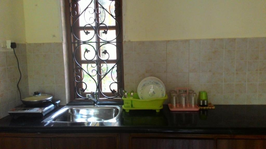 Kuchyň nebo kuchyňský kout v ubytování Antonio's Residency Goa