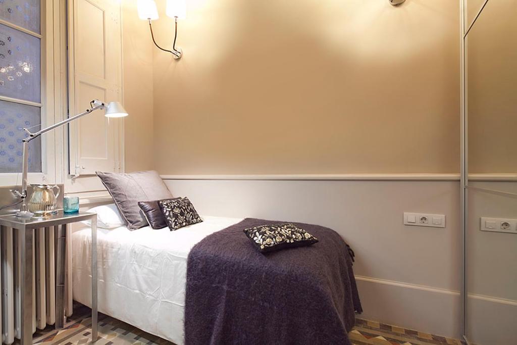 Posteľ alebo postele v izbe v ubytovaní Apartment Barcelona Rentals - Rambla de Catalunya Center