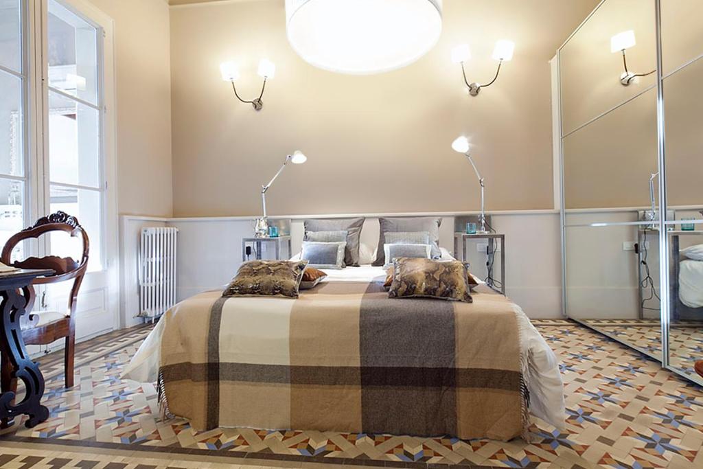 Posteľ alebo postele v izbe v ubytovaní Apartment Barcelona Rentals - Rambla de Catalunya Center