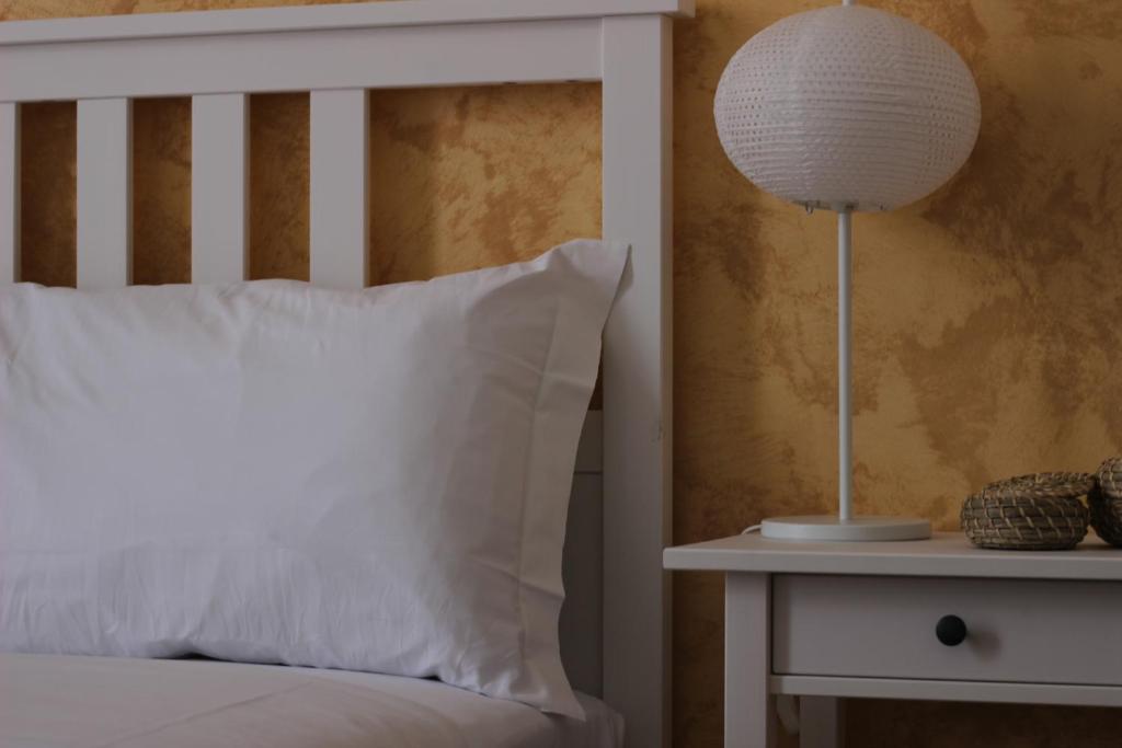 Łóżko lub łóżka w pokoju w obiekcie B&B Gallidoro