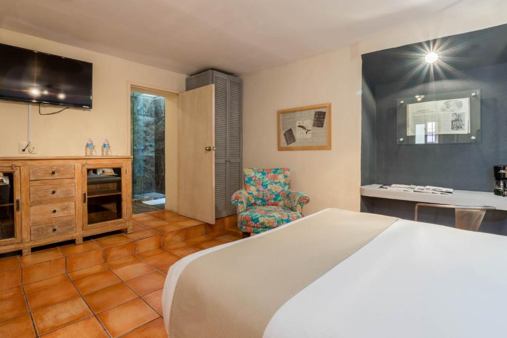 Postel nebo postele na pokoji v ubytování Hotel Damiana Boutique