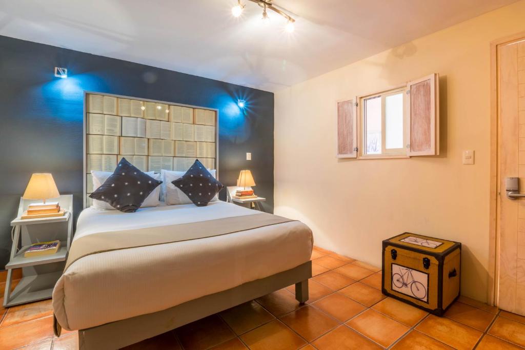 Postel nebo postele na pokoji v ubytování Hotel Damiana Boutique