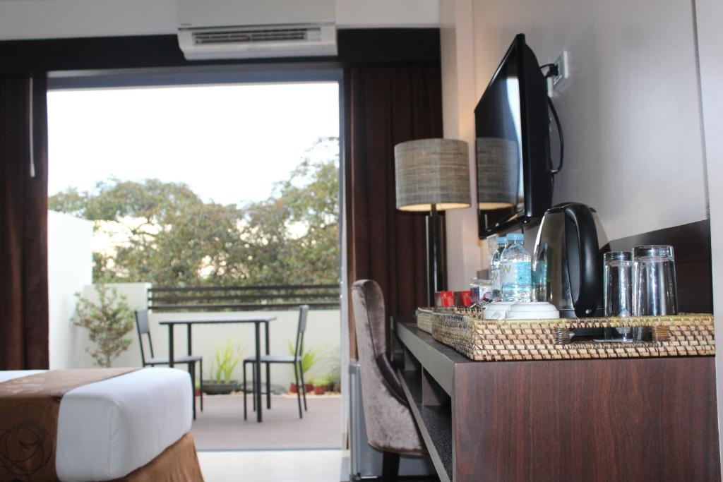 Kuchyň nebo kuchyňský kout v ubytování Kew Hotel Tagbilaran