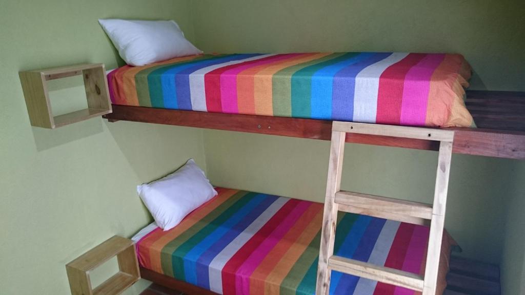Postel nebo postele na pokoji v ubytování Retreat Seaside